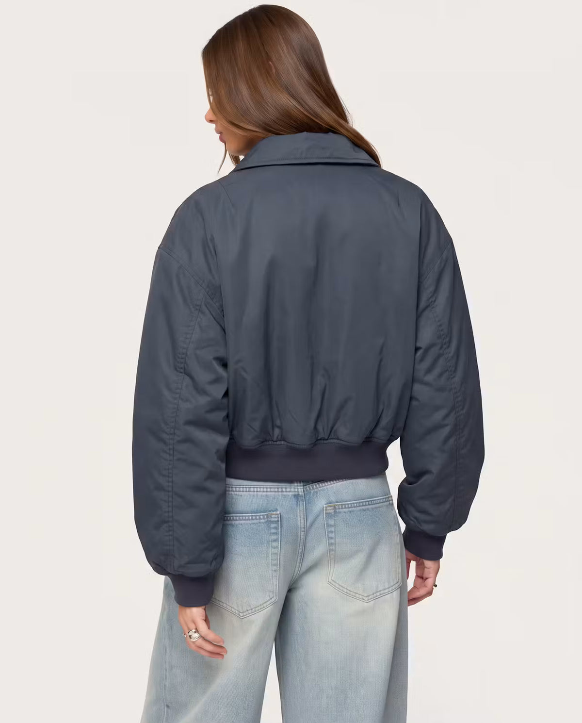 STYLEBURY Capsule Bomber Charcoal jacket, lightweight and stylish with a sleek silhouette, shown on a hanger.