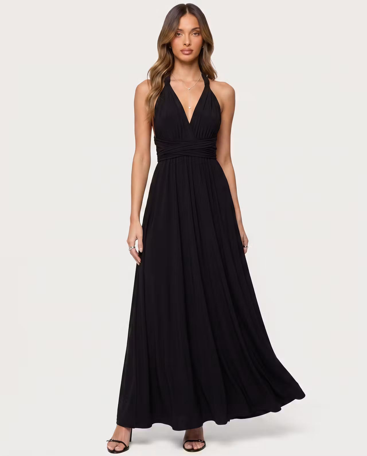 Black twisted maxi dress by STYLEBURY, flowing fabric with a stylish twisted design, full-length dress for elegant occasions.