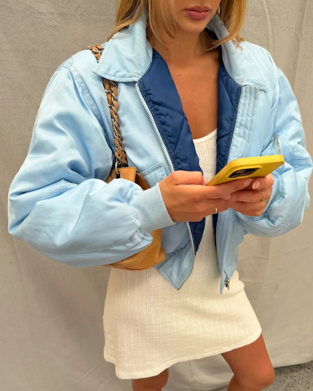 Baby blue capsule bomber jacket by STYLEBURY, shown with front view and zip closure, lightweight and stylish for kids.
