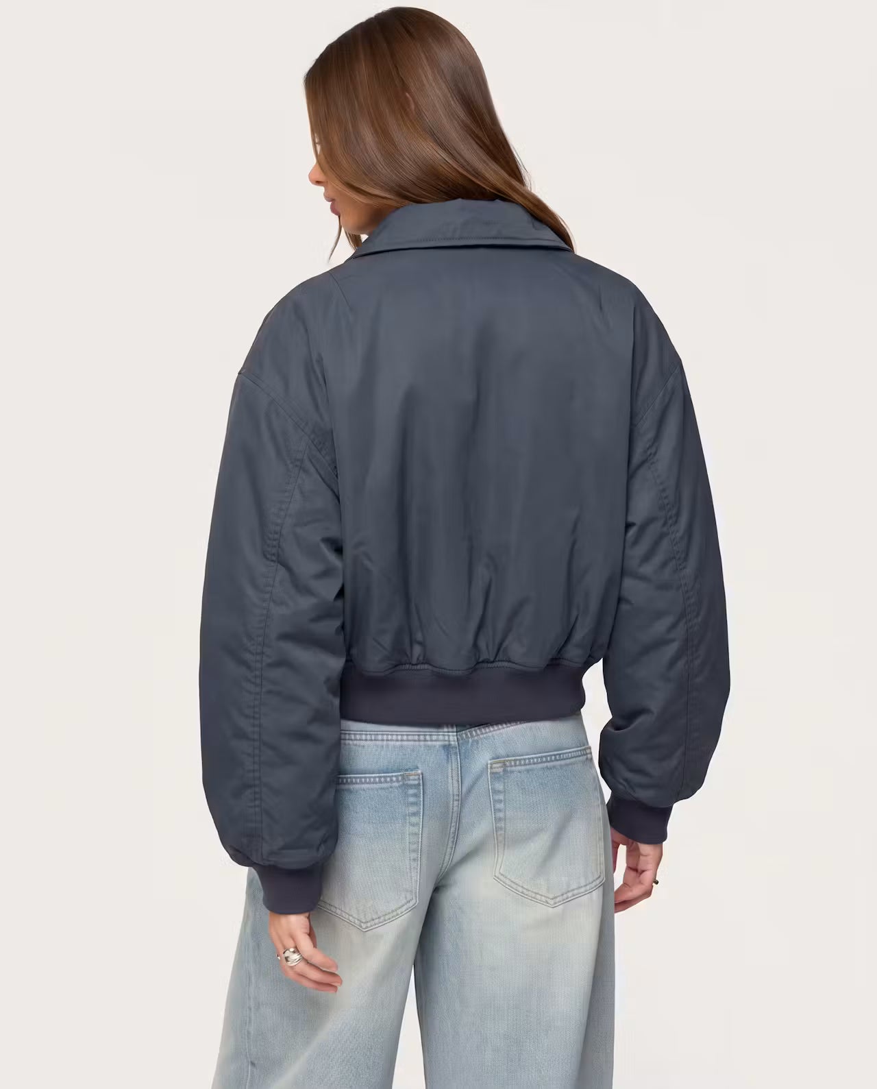 STYLEBURY Capsule Bomber Charcoal jacket, lightweight and stylish with a sleek silhouette, shown on a hanger.