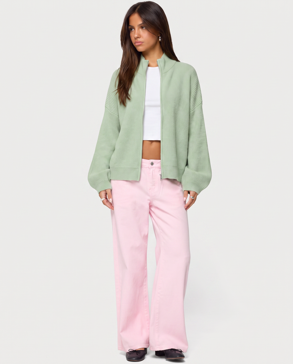 STYLEBURY Zip Knit Cardigan in mint color, featuring a front zipper and ribbed cuffs, displayed on a hanger.