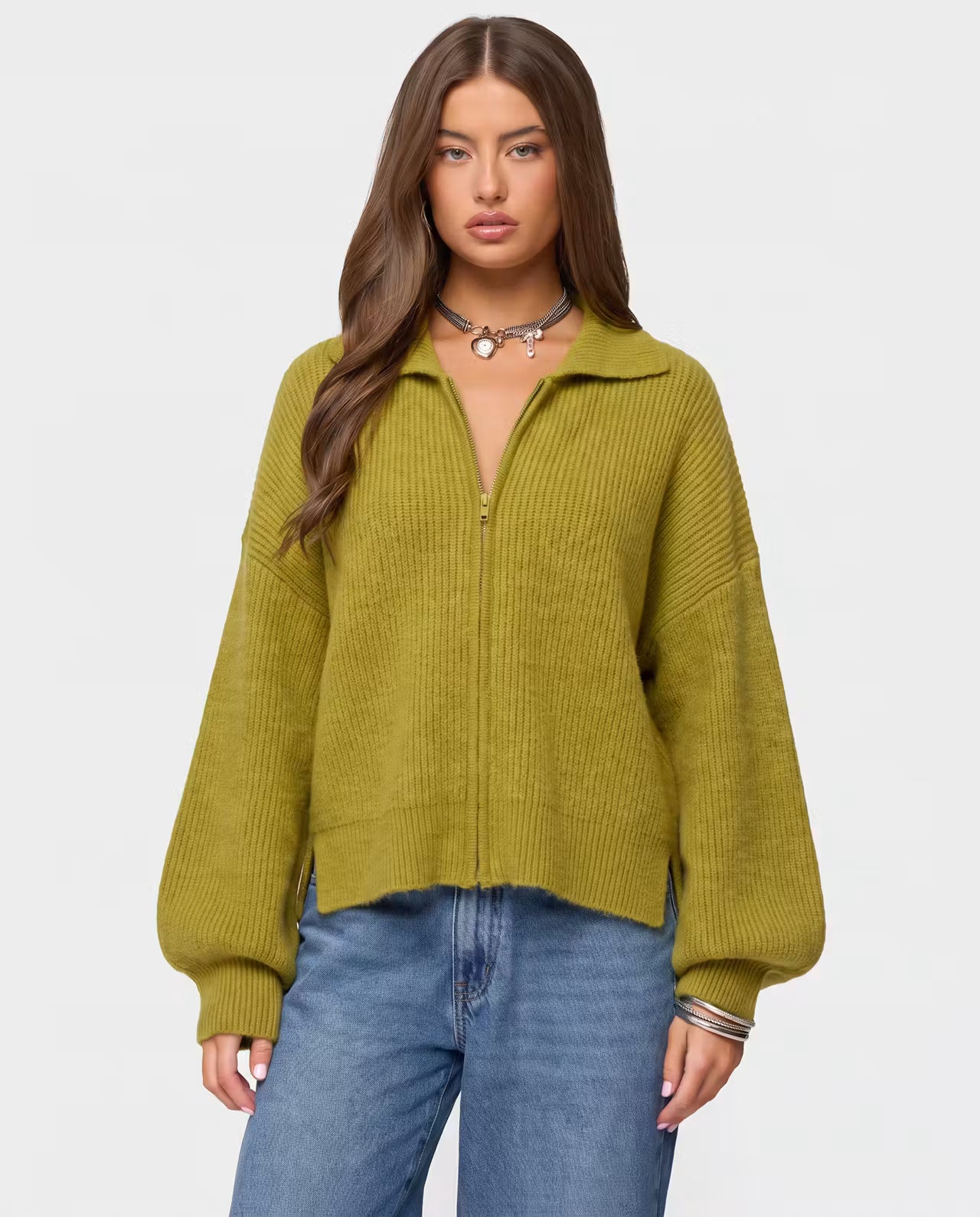 STYLEBURY Zip Knit Cardigan in pistachio color, featuring a front zipper and cozy knit texture, displayed on a hanger.