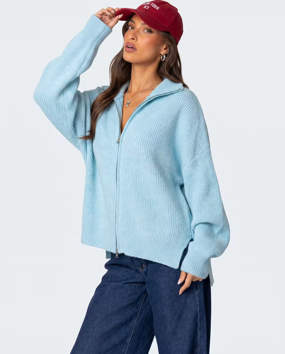 Light blue Zip Knit Cardigan by STYLEBURY, featuring a front zipper and cozy knit texture, displayed on a hanger.